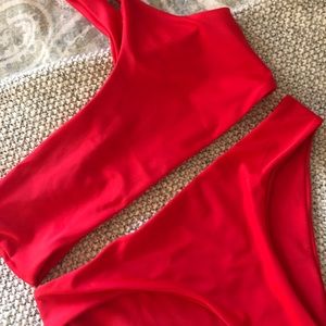 Bright pink one shoulder swimsuit